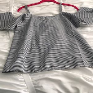 Black and one off shoulder sleeve shirt